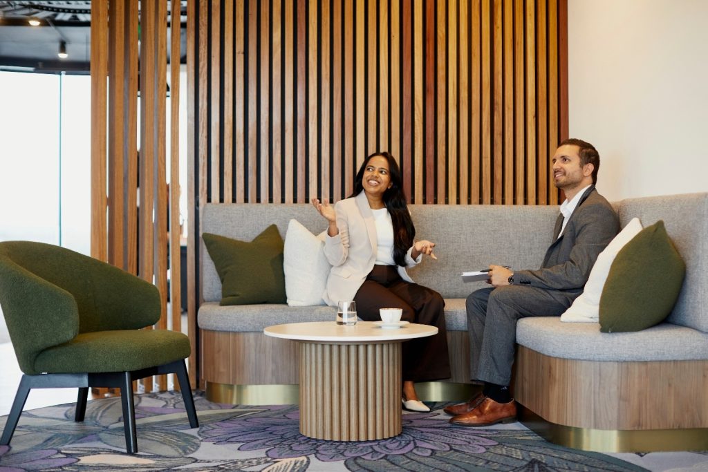 woman and man on sofa talking